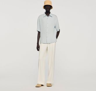 Sandro Pleated shirt with shark collar