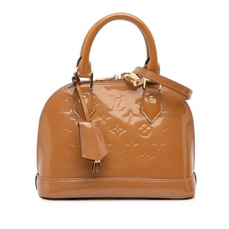 Louis Vuitton Alma Bb Monogram Geperst Leer