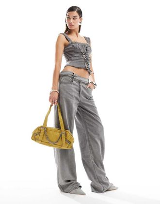 Lioness denim jeans with cross waist in washed gray - part of a set