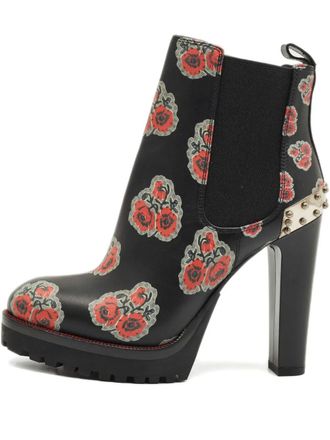 Alexander McQueen Laarzen met bloemenprint en studs - Zwart