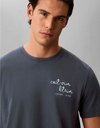 Calvin Klein Jeans T-shirt con logo sul petto grigia-Grigio