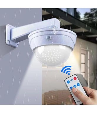 Trade Shop Trade Shop - Camara Falsa Con Panel Solar Con Sensor De Movimiento Foco 44led