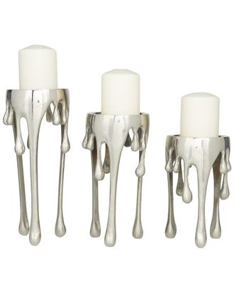CosmoLiving by Cosmopolitan Dnu Cosmoliving By Cosmopolitan Set Of 3 Silver Aluminum Abstract Pillar Drip Candle Holder With Melting Designed Legs