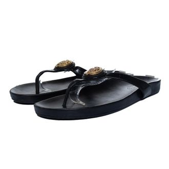 Gucci Gucci, zwarte leren sandalen met T-bandje en hysterische details