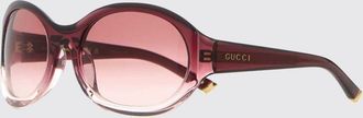 Gucci Occhiali da sole ovali in acetato nero e rosso con logo lettering