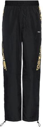 Versace PARTES DE ABAJO - Pantalones en YOOX.COM