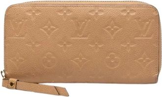 Louis Vuitton Pre-owned Lange portemonnee (bi-fold) - Dames - Vintage Accessoires - Beige - ONE Size - Leer - Vintage