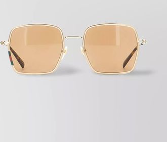Gucci metal sunglasses with rectangular frame and tinted lenses