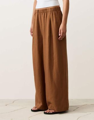 Oysho Pantaloni 100% lino marroni a fondo ampio-Marrone