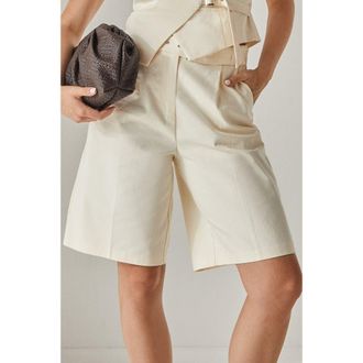 NASTY GAL Longline Cotton Twill Buckle Jort Shorts in Cream at Nordstrom, Size 2