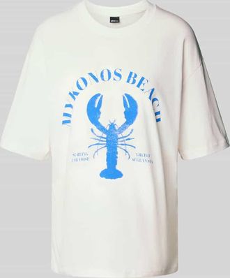 Gina Tricot Oversized T-Shirt mit Motiv-Print und Rundhalsausschnitt in Ecru, Größe XS