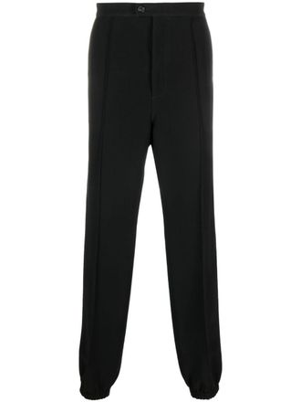 Alexander McQueen tailored track pants - men - Cotton/Viscose - 50 - Black
