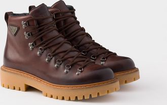 Prada Laced leather booties