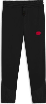 HUGO BOSS Cotton-blend tracksuit bottoms with waxed-stamp logo