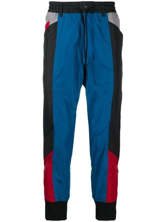 Yohji Yamamoto colourblock tapered track pants - men - Polyamide - S - Black