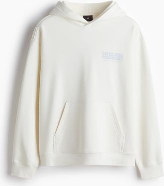 H&M Bedruckter Hoodie in Relaxed Fit - White