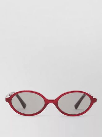 Miu Miu oval sunglasses metal accents dark lenses