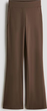 H&M Ausgestellte Hose mit Four-way-Stretch - Beige