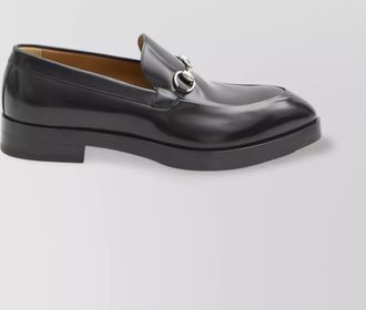 Gucci metal buckle pointed loafers with leather sole