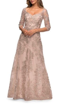 La Femme Long Lace A-line Three Quarter Sleeve Gown in Champagne at Nordstrom, Size 20