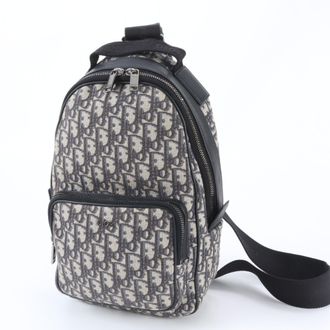 Dior Beige Black Leather Canvas Backpack (Pre-Owned)