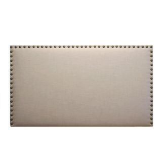 Els Banys Cabecero tapizado detalle tachuelas tela esco beige