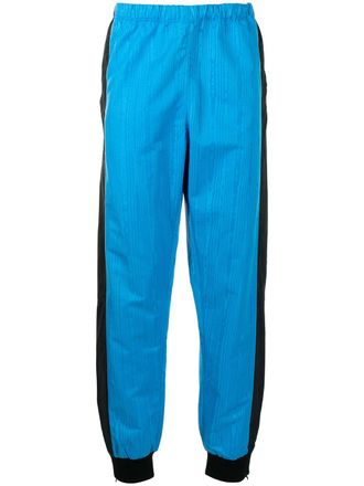 Marine Serre satin-finish track pants - Blue