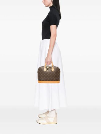 Louis Vuitton 2002 Monogram Alma PM handbag - Bruin
