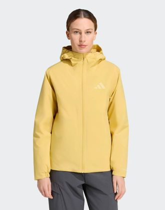 adidas Terrex Multi Essentials Climaproof - Giacca con cappuccio isolante color pirite-Giallo