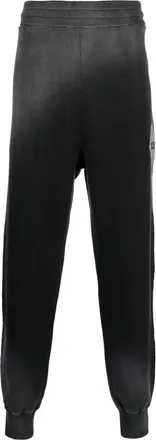 A-Cold-Wall* logo-print gradient-effect track pants - men - Cotton/Cotton - L - Black