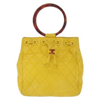 Chanel Vintage Resin Handle Drawstring Bucket Bag Quilted Lambskin Yellow Leather Handbag (Pre-Owned)