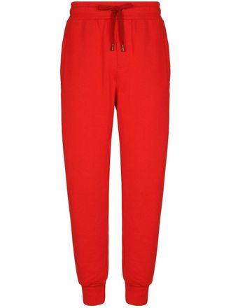 Dolce & Gabbana logo-embossed track pants - Red