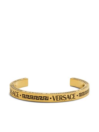Versace engraved-logo cuff bracelet - men - Metal (Other) - M - Gold