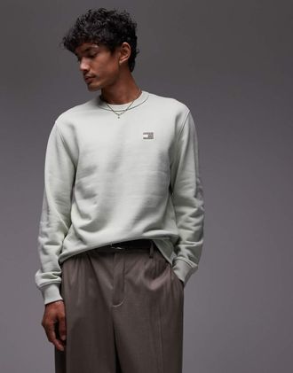 Tommy Jeans Felpa verde salvia con toppa piccola