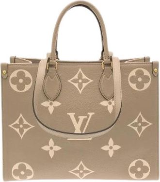 Louis Vuitton Pre-owned On The Go Monogram Empreinte Tas - Dames - Vintage Shopper - Beige - ONE Size - Leer - Vintage