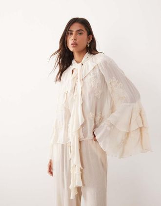 Mango Blusa premium color crema ricamata con volant-Neutro