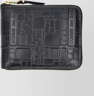 Comme Des Garçons zipper wallet with embossed design