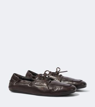 Prada Shuffle leather boat shoes
