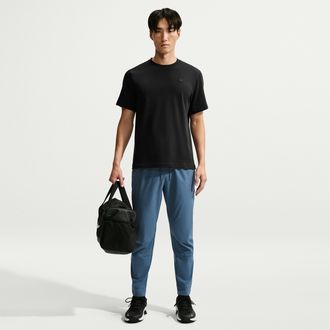 Nike Mens Unlimited Dri-FIT Zippered Cuff Versatile Pants in Blue | FB7548-438