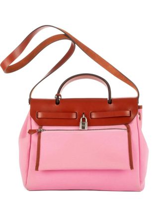 Herm&egrave;s 2000s leather-trimmed shoulder bag - women - Leather/Canvas - One Size - Pink
