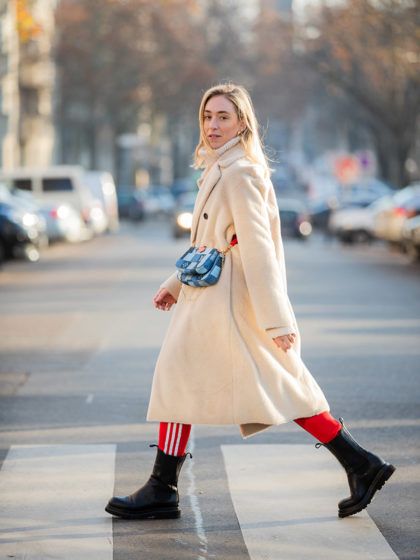 Chándal con botas: el dúo que amarás este invierno