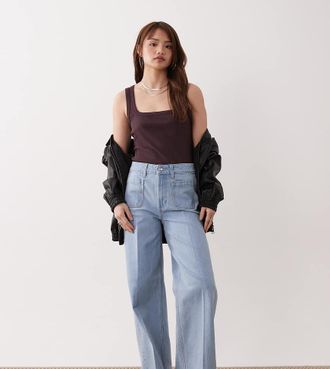 Asos Petite ASOS DESIGN Petite - Jeans a vita alta lavaggio chiaro con fondo ampio e tasche anteriori-Blu