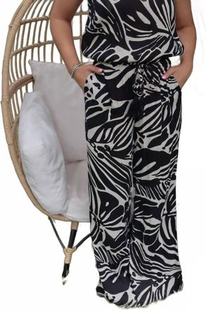 Elan Rio Strapless Jumpsuit In Black And Off-White Tropical Print
