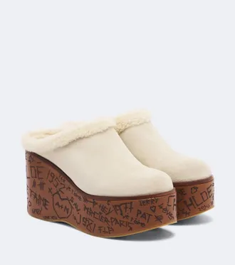Chlo&eacute; Chlo&eacute; Mules con plataforma Maxime de ante y borrego