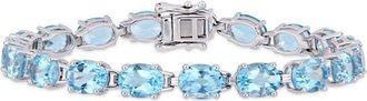 Amour 28 1/2 CT TGW Oval-cut Sky-blue Topaz Tennis Bracelet In Sterling Silver