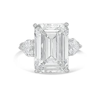 Diana M. Jewels Platinum Lab grown 6ct Emerald diamond ring with heart diamonds on the side and micropave band