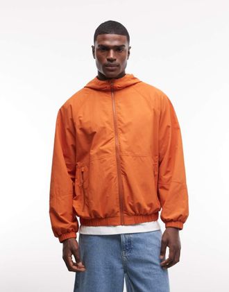 Asos StormMAX - Giacca impermeabile ripiegabile arancione