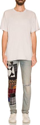 Amiri Art Patch Denim Jeans In Clay Indigo