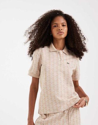 Lacoste Polo rosa chiaro con monogramma in coordinato