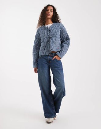 Levi's Giacca di jeans trapuntata con fiocco sul davanti blu a righe